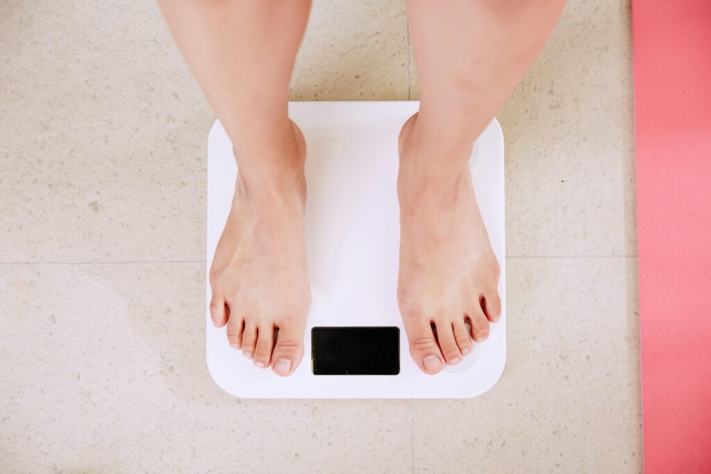 feet on a scale wanting to slim down after 30